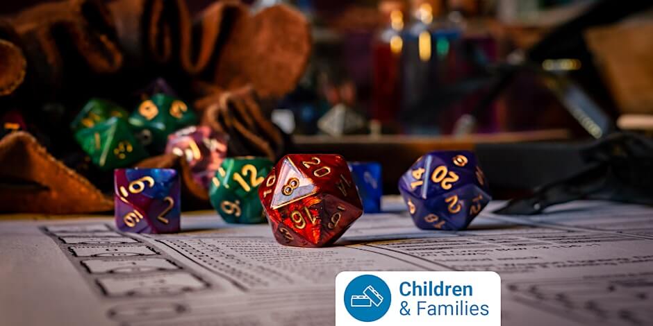 A close up image of several, multi-coloured 20-sided dice